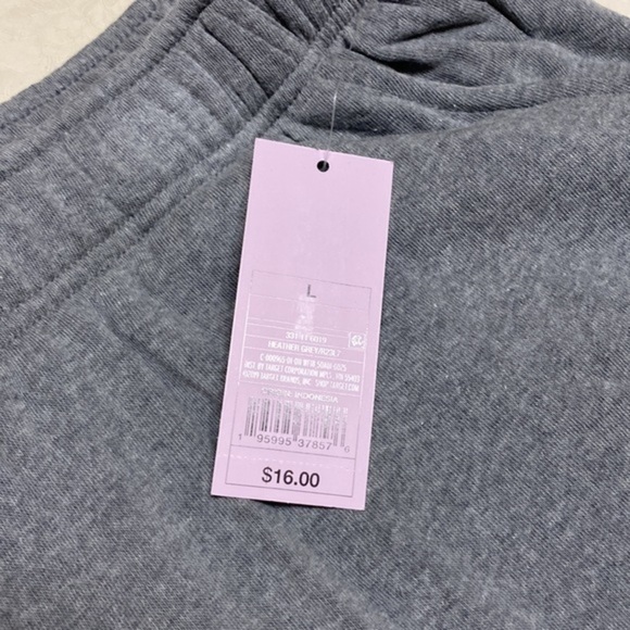 Grey shorts size l tee shirt material. $6 each. I have 24 of them - Picture 3 of 4